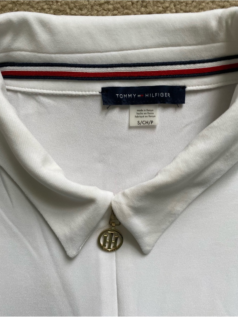 Tommy Hilfiger Sleeveless White Polo Top with Gold Charm Accent - Picture 2 of 5